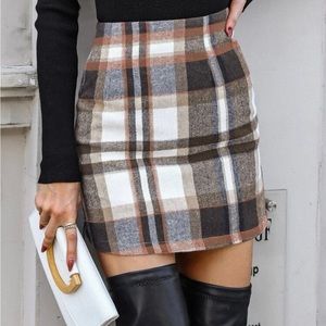 SHEIN plaid mini skirt. Brown/white/orange/navy. Size small. NEVER WORN.